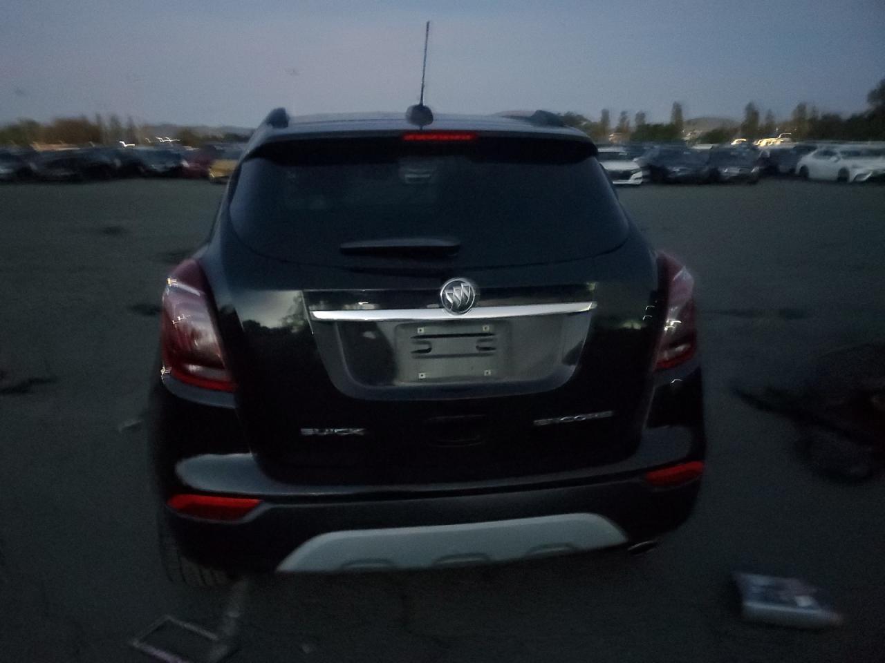 2018 Buick Encore Essence VIN: KL4CJCSB7JB596511 Lot: 92350205