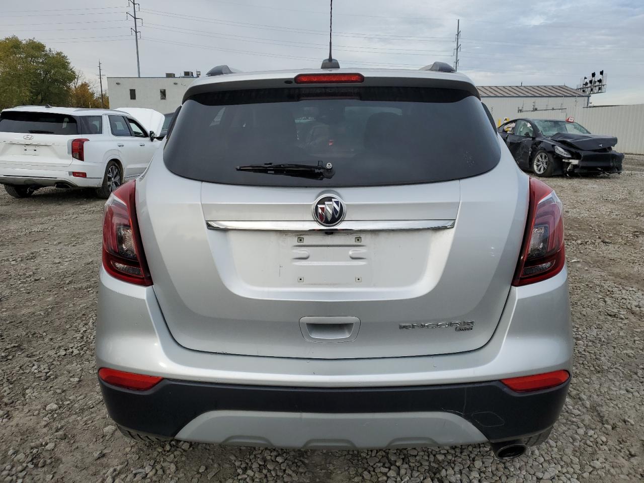 2019 Buick Encore Essence VIN: KL4CJGSMXKB768041 Lot: 82699865