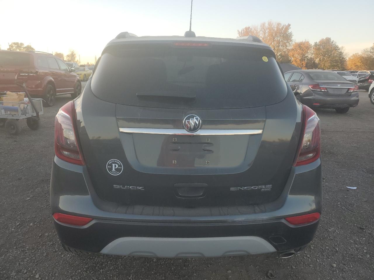 2018 Buick Encore Essence VIN: KL4CJGSB9JB566952 Lot: 91309735