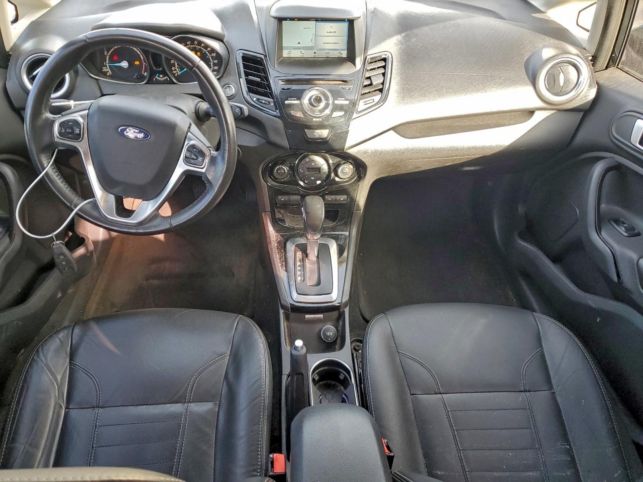 2016 Ford Fiesta Titanium VIN: 3FADP4FJ3GM203241 Lot: 94157255