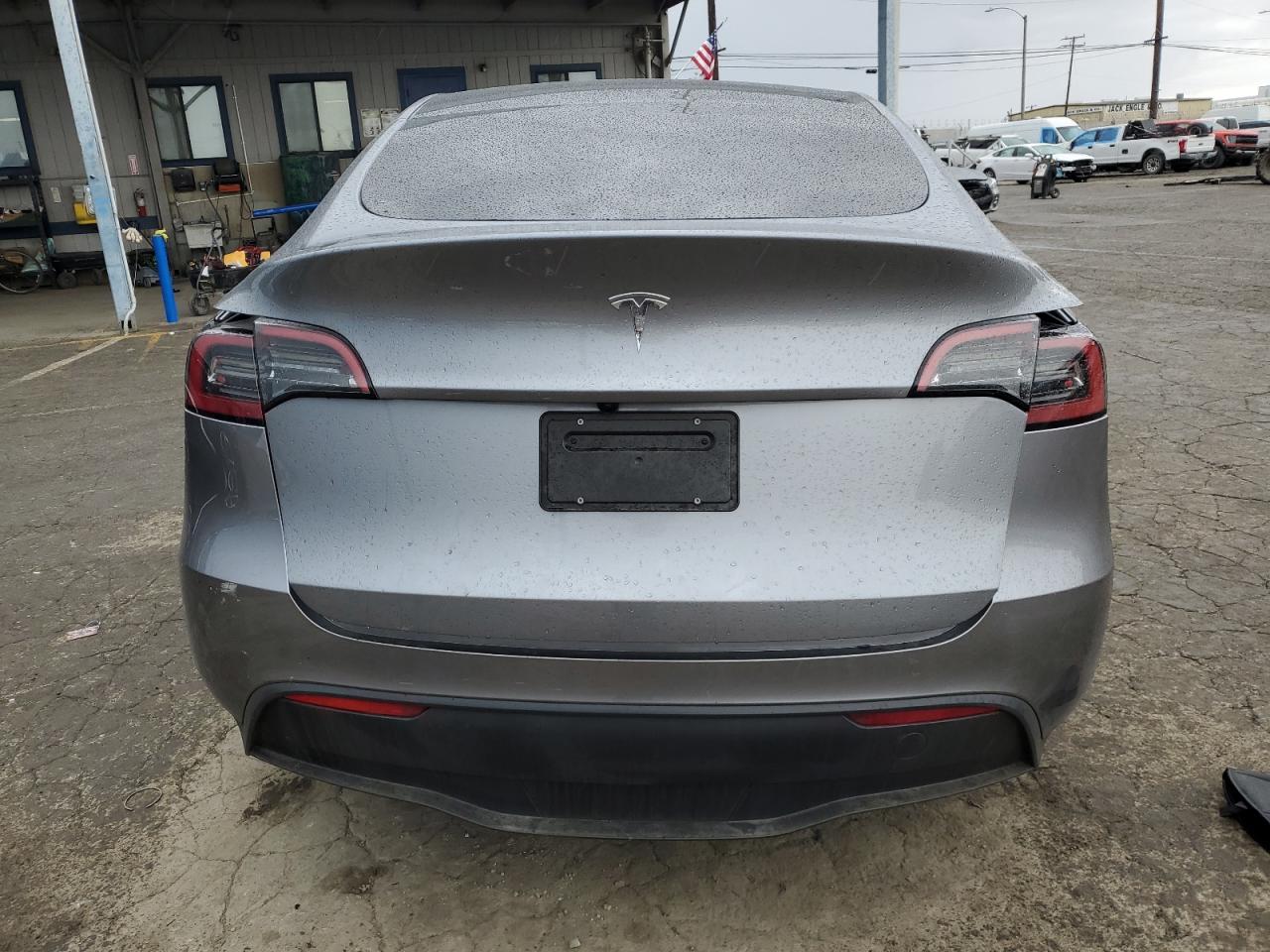 2025 Tesla Model Y VIN: 7SAYGDED5SF318706 Lot: 93354675