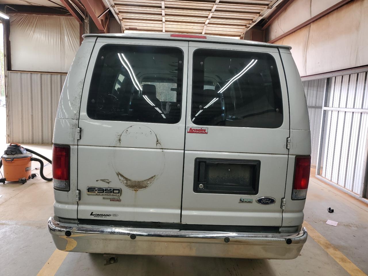 2010 Ford Econoline E350 Super Duty Wagon VIN: 1FBNE3BL0ADA31473 Lot: 91546285