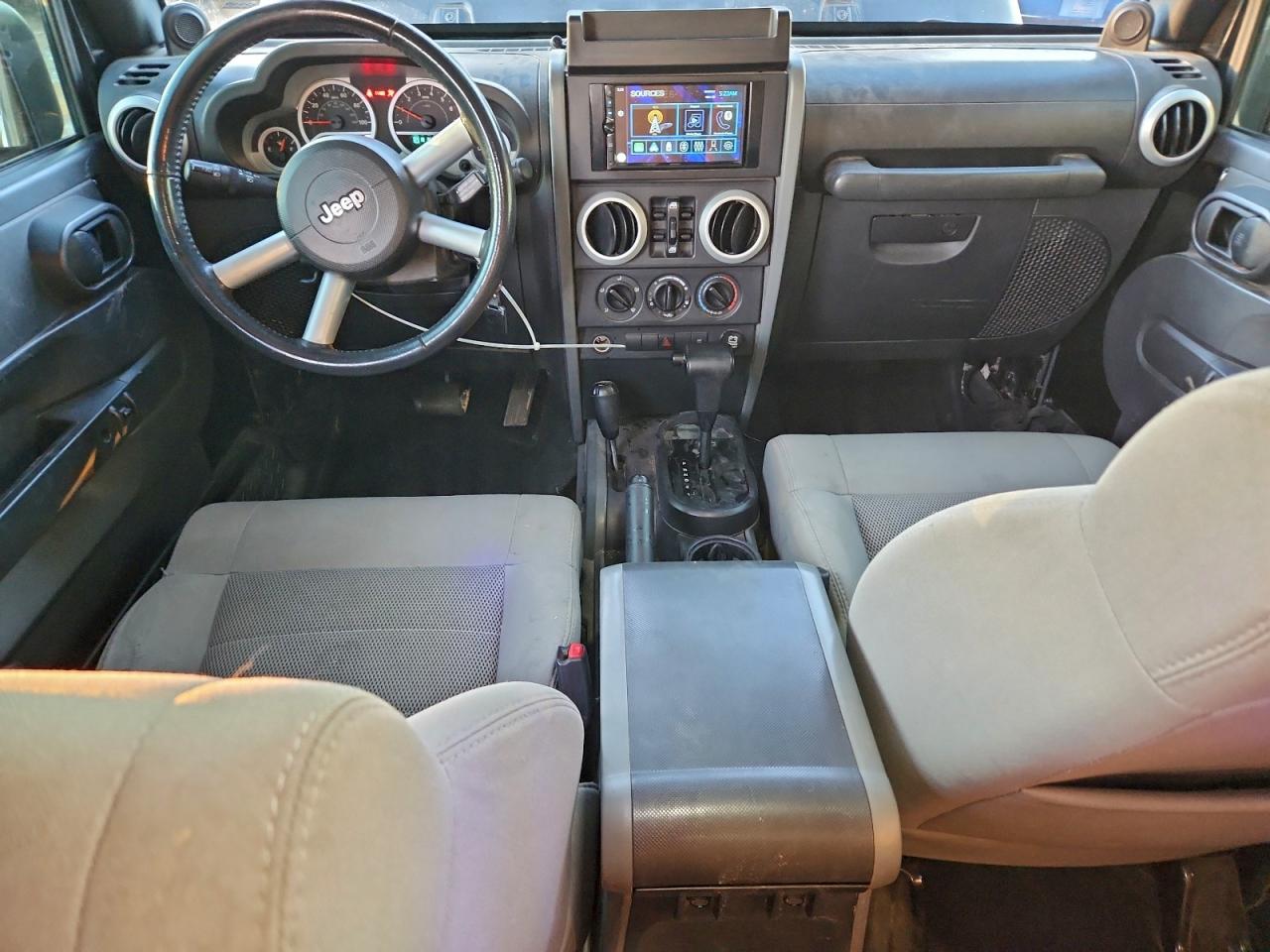 2008 Jeep Wrangler Unlimited Sahara VIN: 1J4GA59168L631974 Lot: 94516735