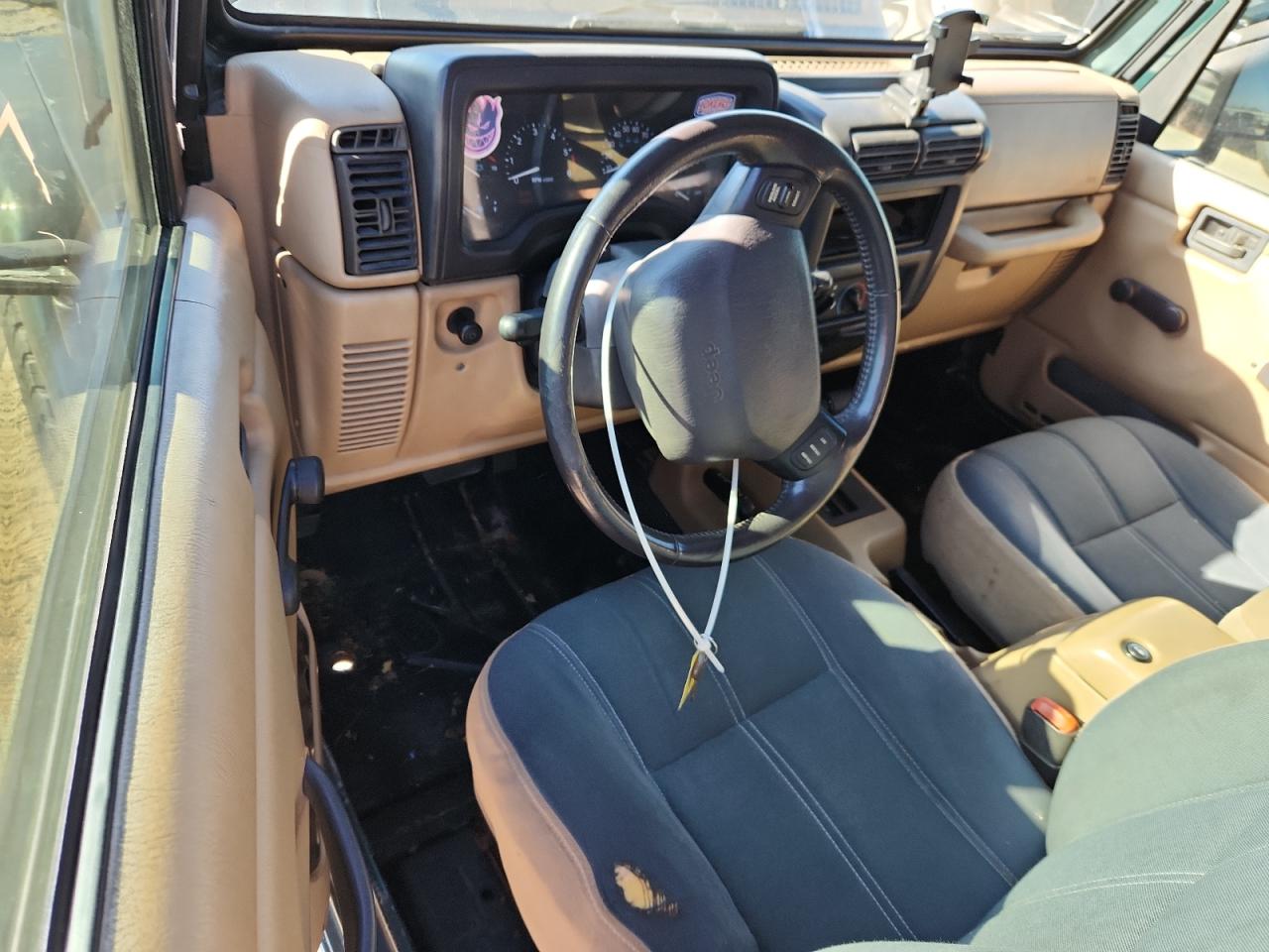 1999 Jeep Wrangler / Tj Sahara VIN: 1J4FY49S0XP402594 Lot: 93293305