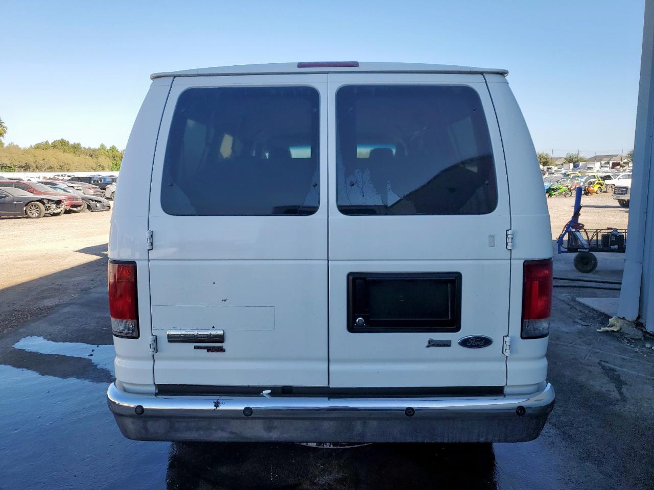 2009 Ford Econoline E350 Super Duty Wagon VIN: 1FBNE31L89DA27636 Lot: 92701035