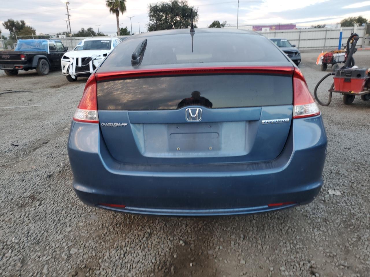 2010 Honda Insight Ex VIN: JHMZE2H7XAS017057 Lot: 92918095