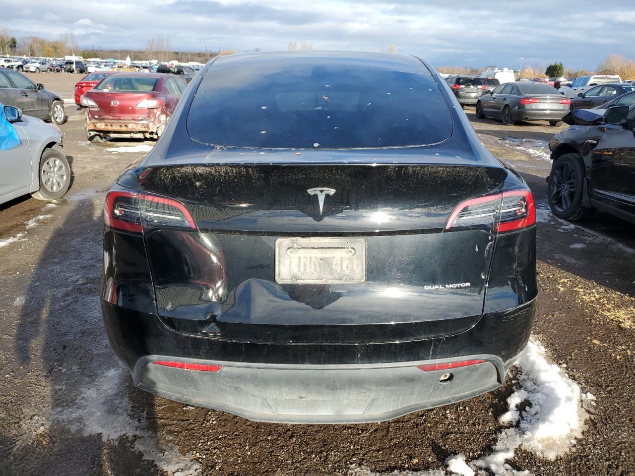 2023 Tesla Model Y VIN: 7SAYGDEE5PF648085 Lot: 90656565