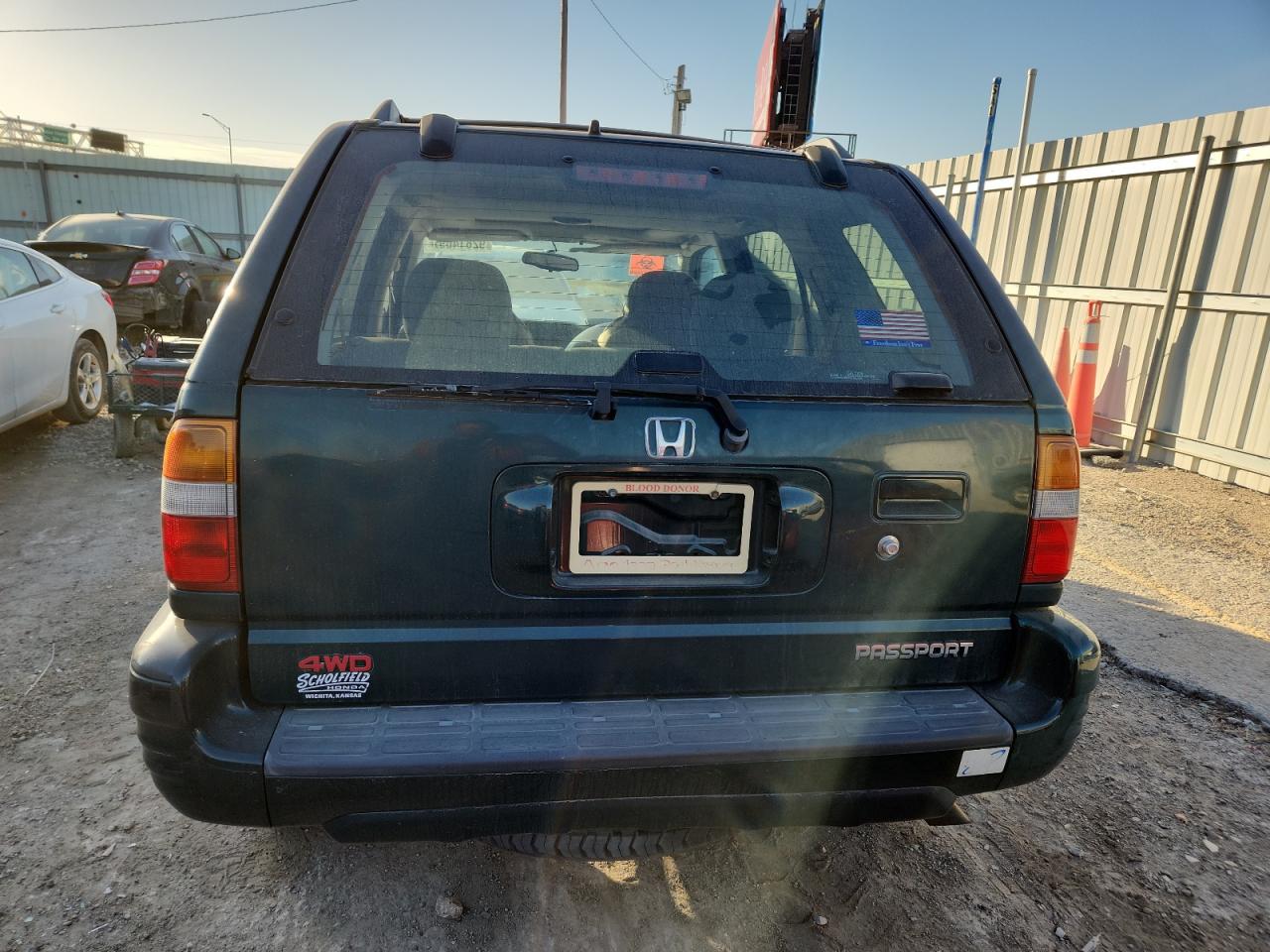 2000 Honda Passport Ex VIN: 4S6DM58W7Y4414833 Lot: 92814695