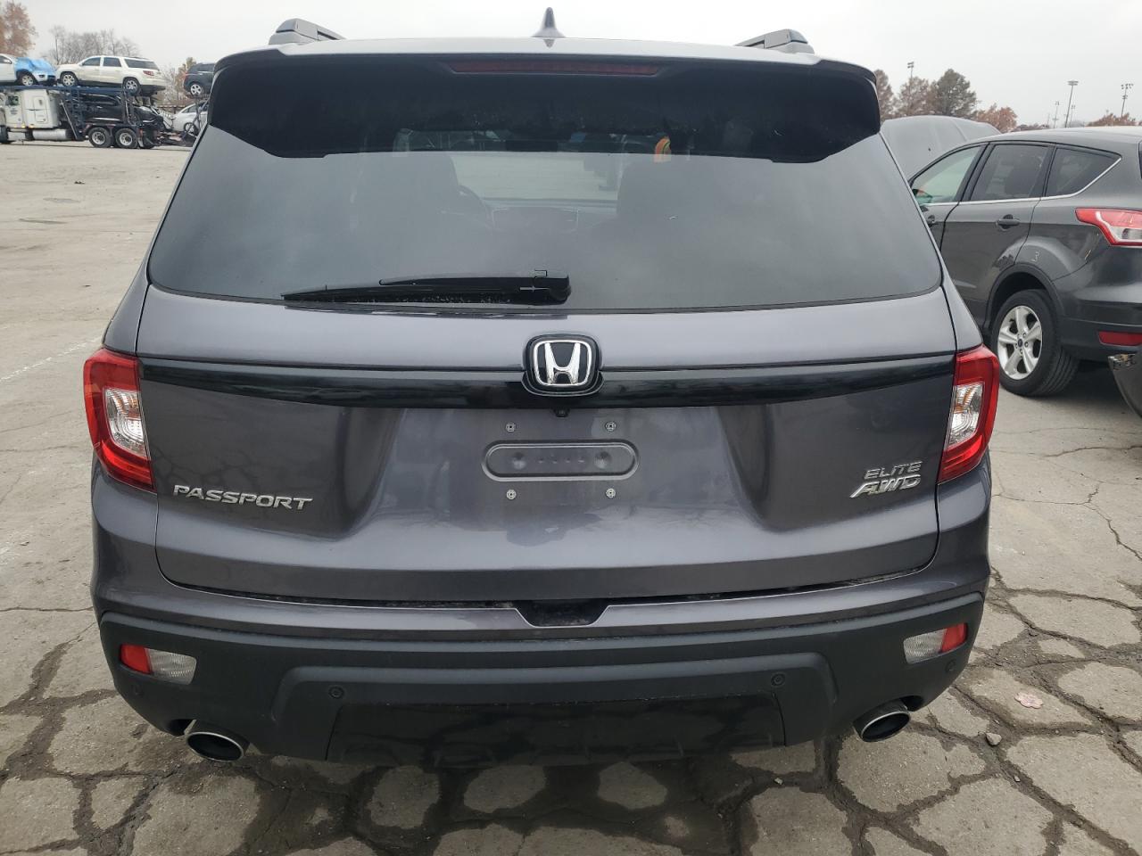 2021 Honda Passport Elite VIN: 5FNYF8H01MB018003 Lot: 93725915