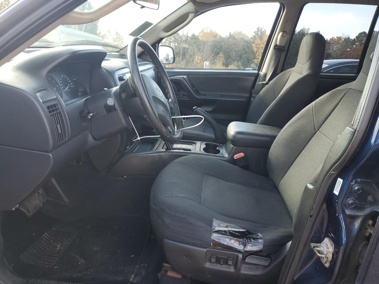 2003 Jeep Grand Cherokee Laredo VIN: 1J4GW48S73C584811 Lot: 92169245