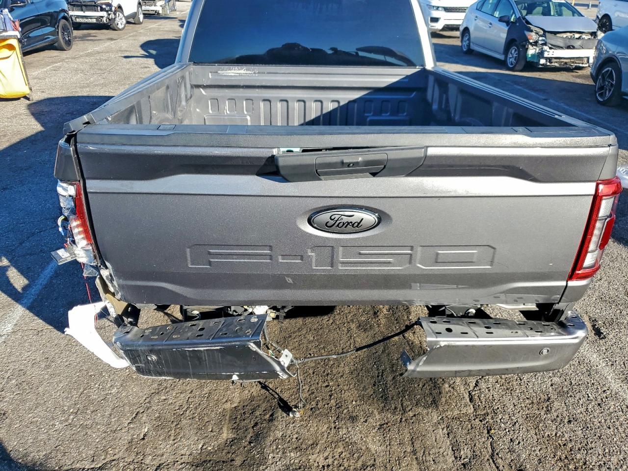 2022 Ford F150 VIN: 1FTMF1E52NKE23281 Lot: 94124625