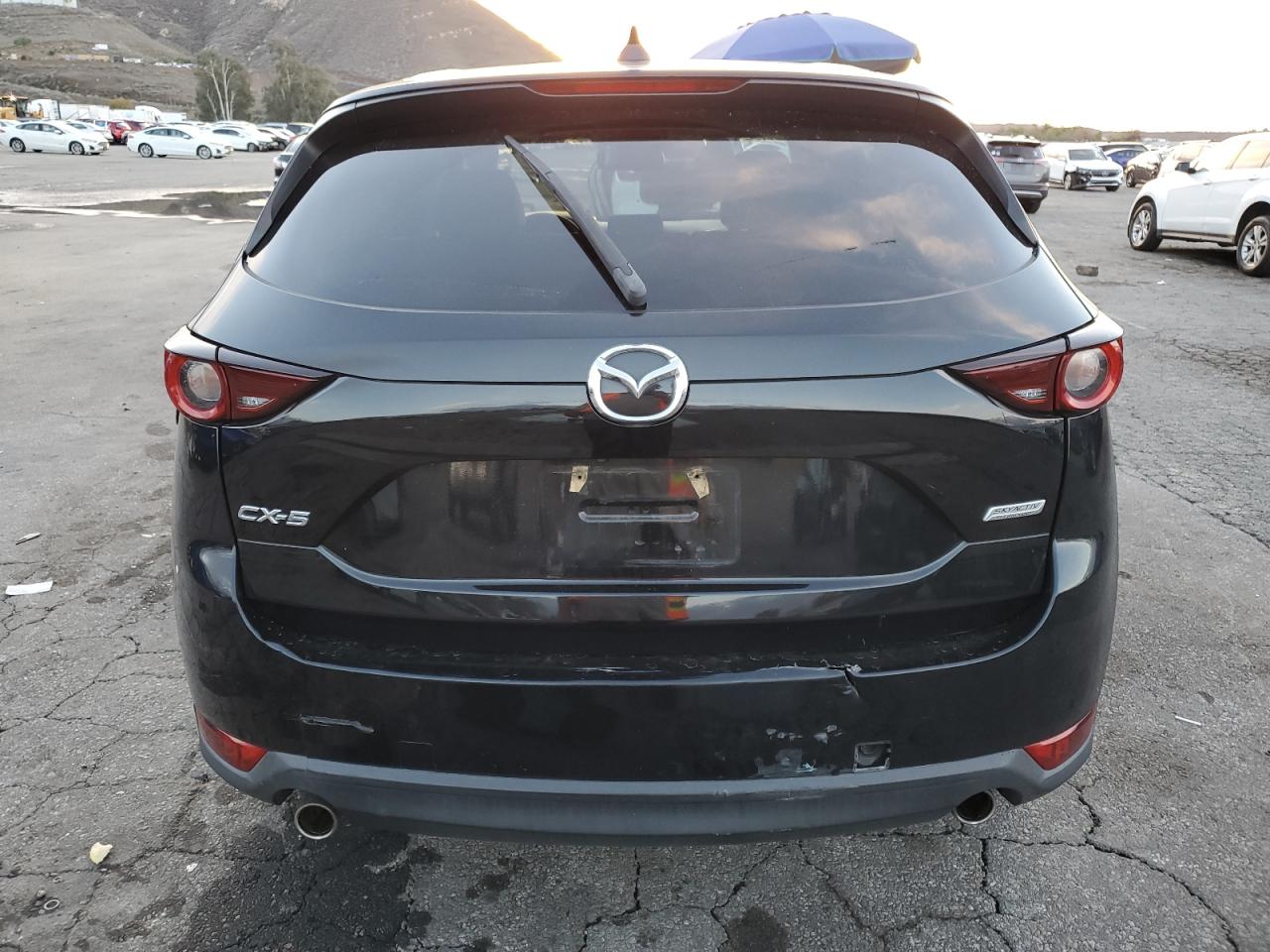 2018 Mazda Cx-5 Touring VIN: JM3KFACM4J1437935 Lot: 93514105