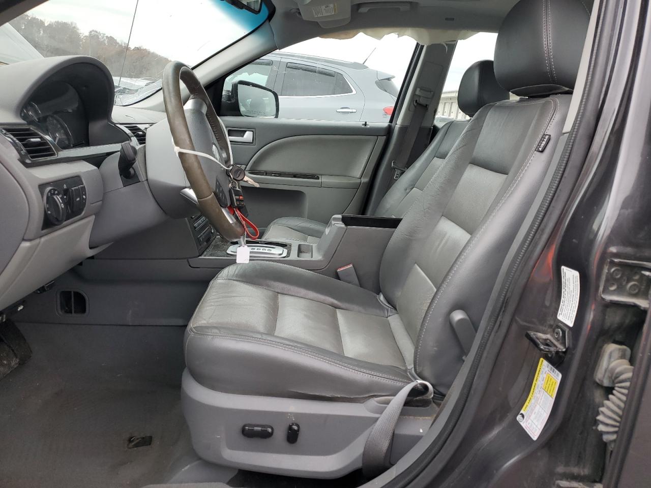 2007 Mercury Montego Premier VIN: 1MEHM42197G610418 Lot: 92827915