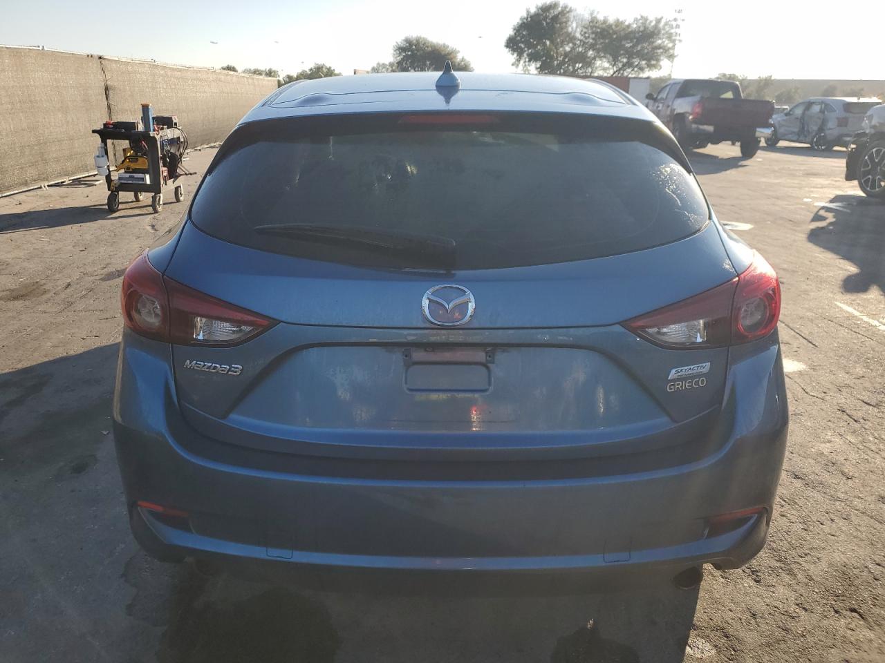 2018 Mazda 3 Grand Touring VIN: 3MZBN1M31JM173154 Lot: 93317105