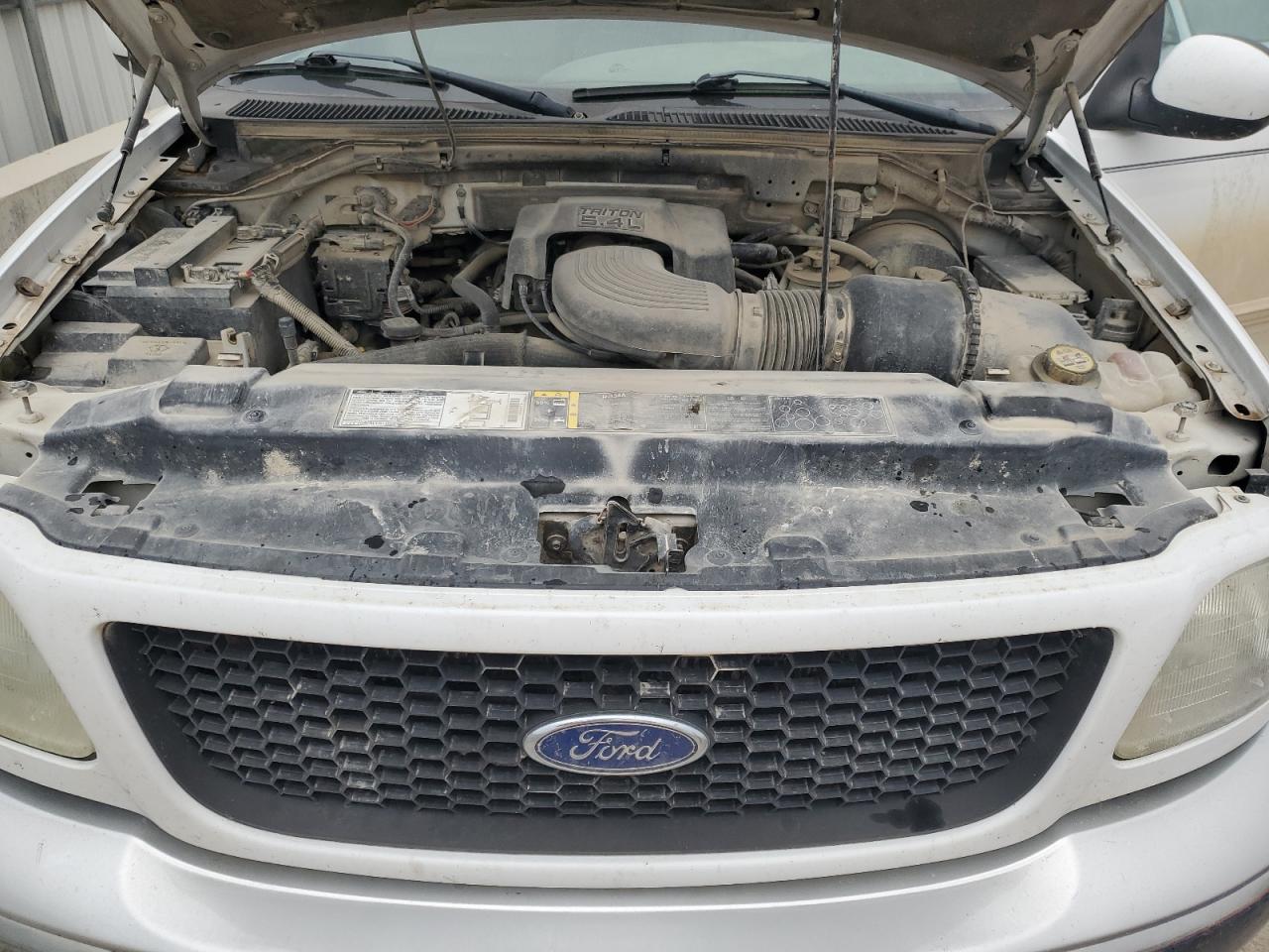 2002 Ford F150 VIN: 1FTRX18L82NA67703 Lot: 93513105