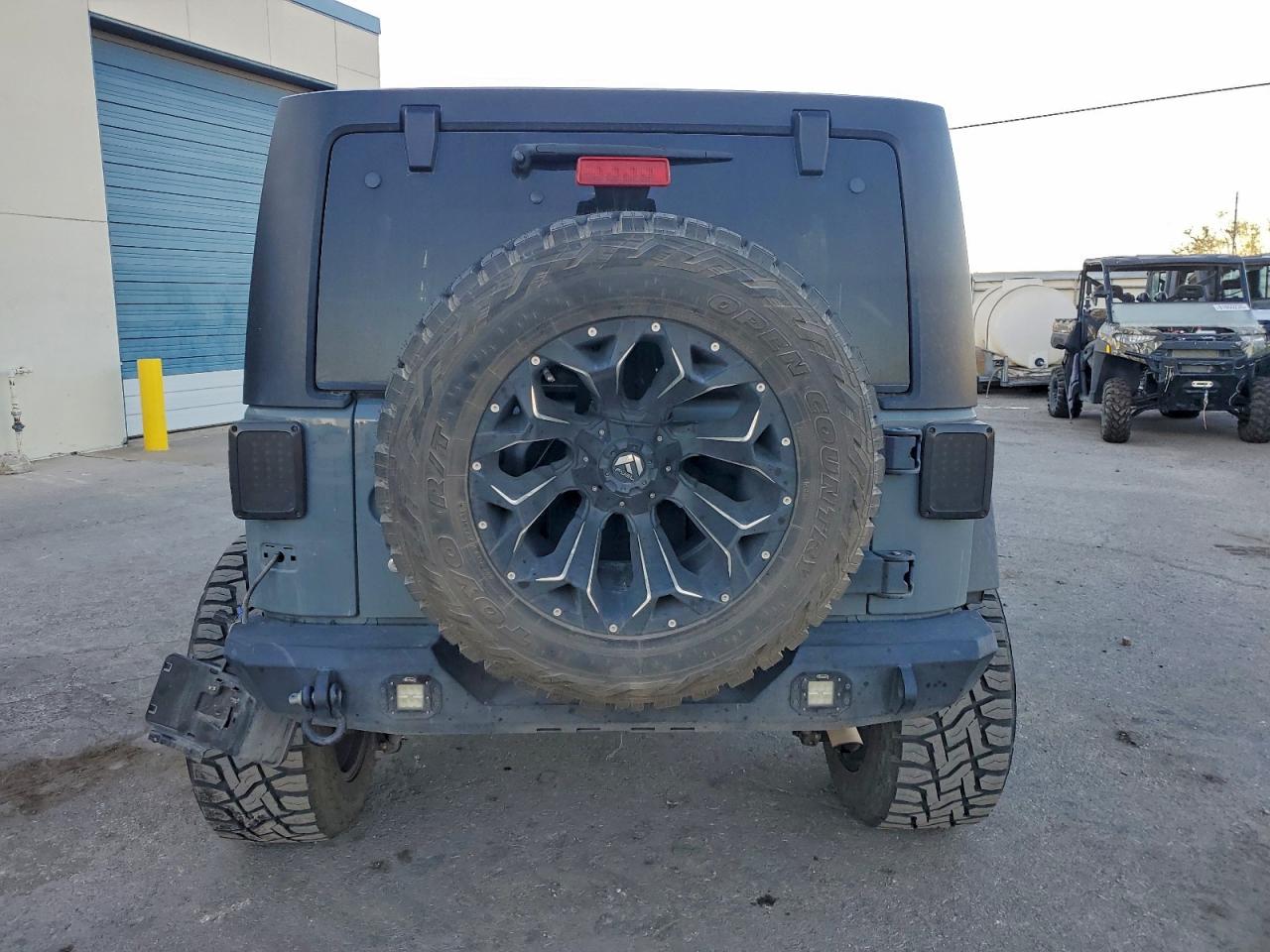 2015 Jeep Wrangler Unlimited Sport VIN: 1C4BJWDG0FL547499 Lot: 94805025