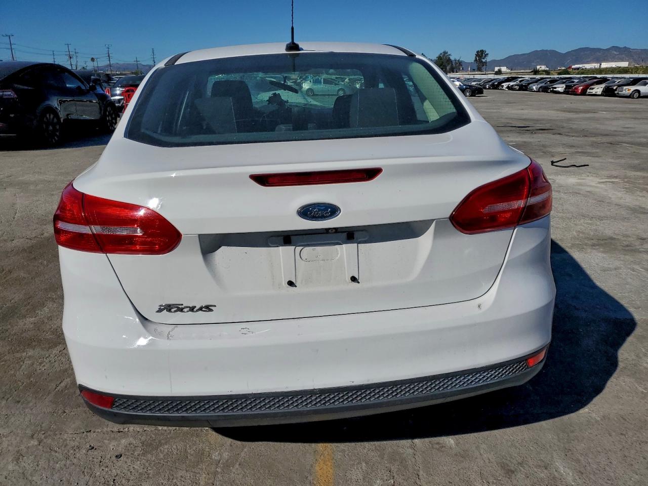 2016 Ford Focus S VIN: 1FADP3E27GL238662 Lot: 94382135