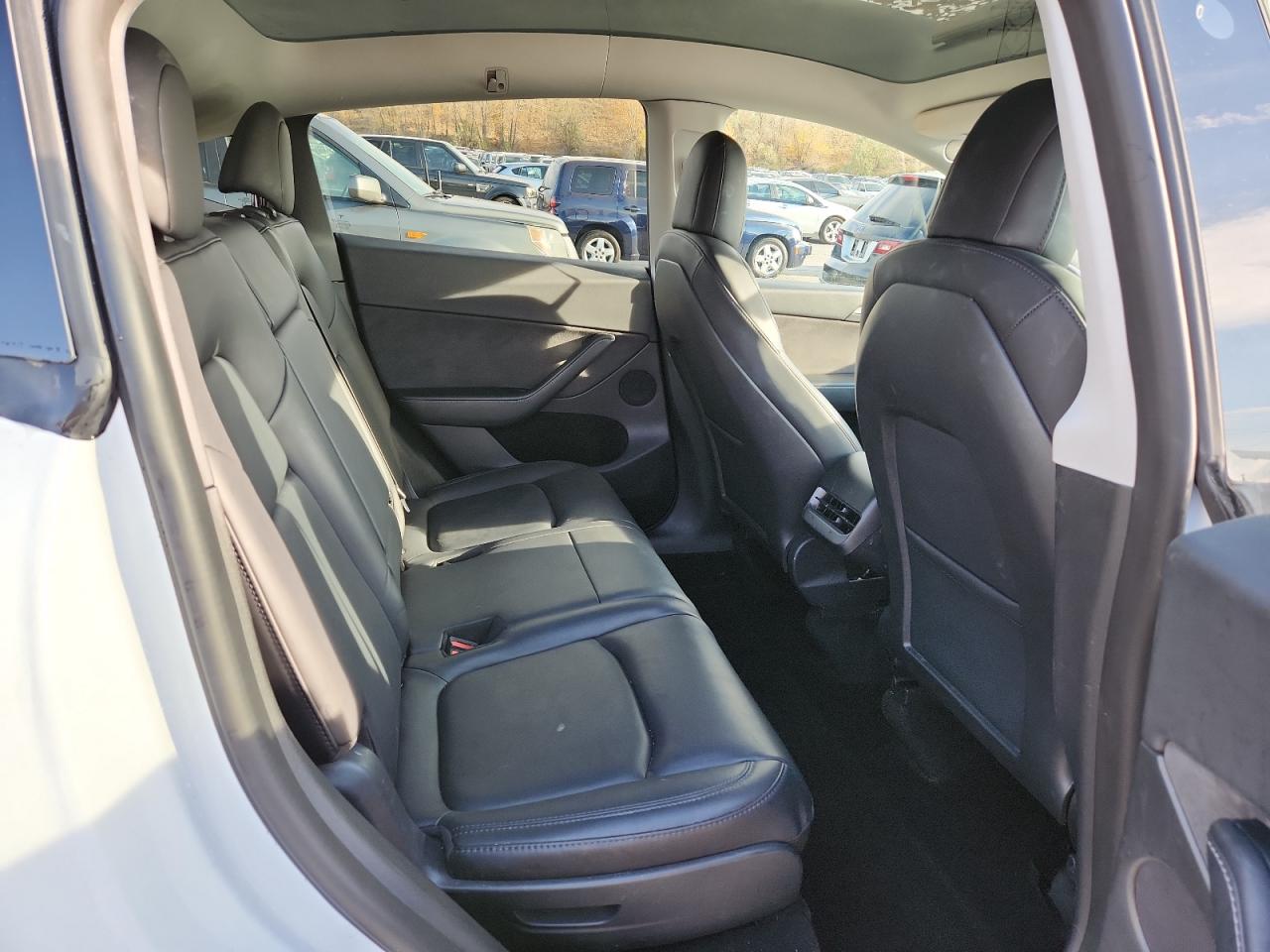 2023 Tesla Model Y VIN: 7SAYGAEE3PF591383 Lot: 91052325