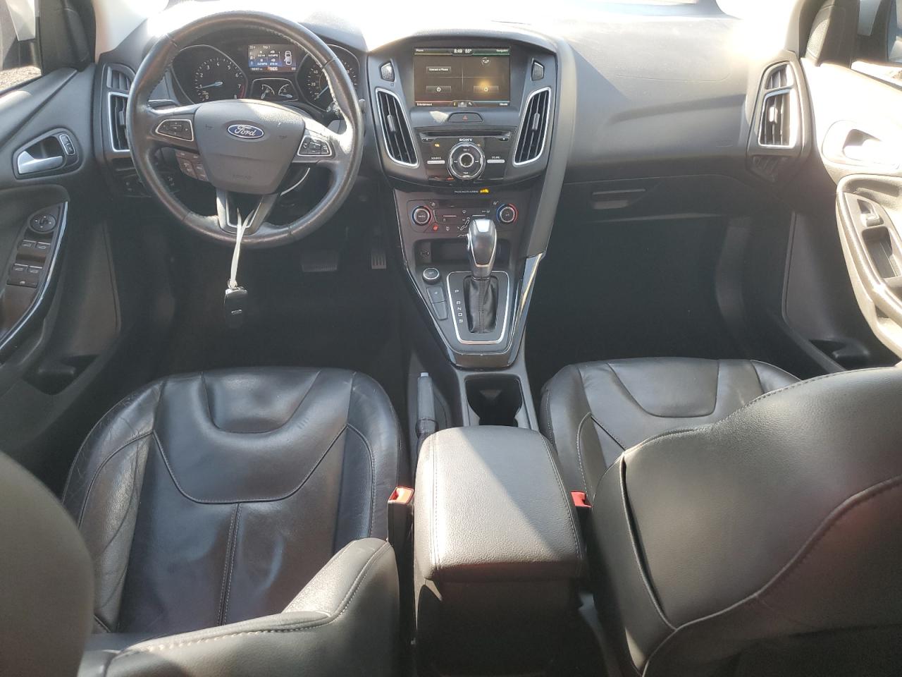 2015 Ford Focus Titanium VIN: 1FADP3J23FL383637 Lot: 91919455