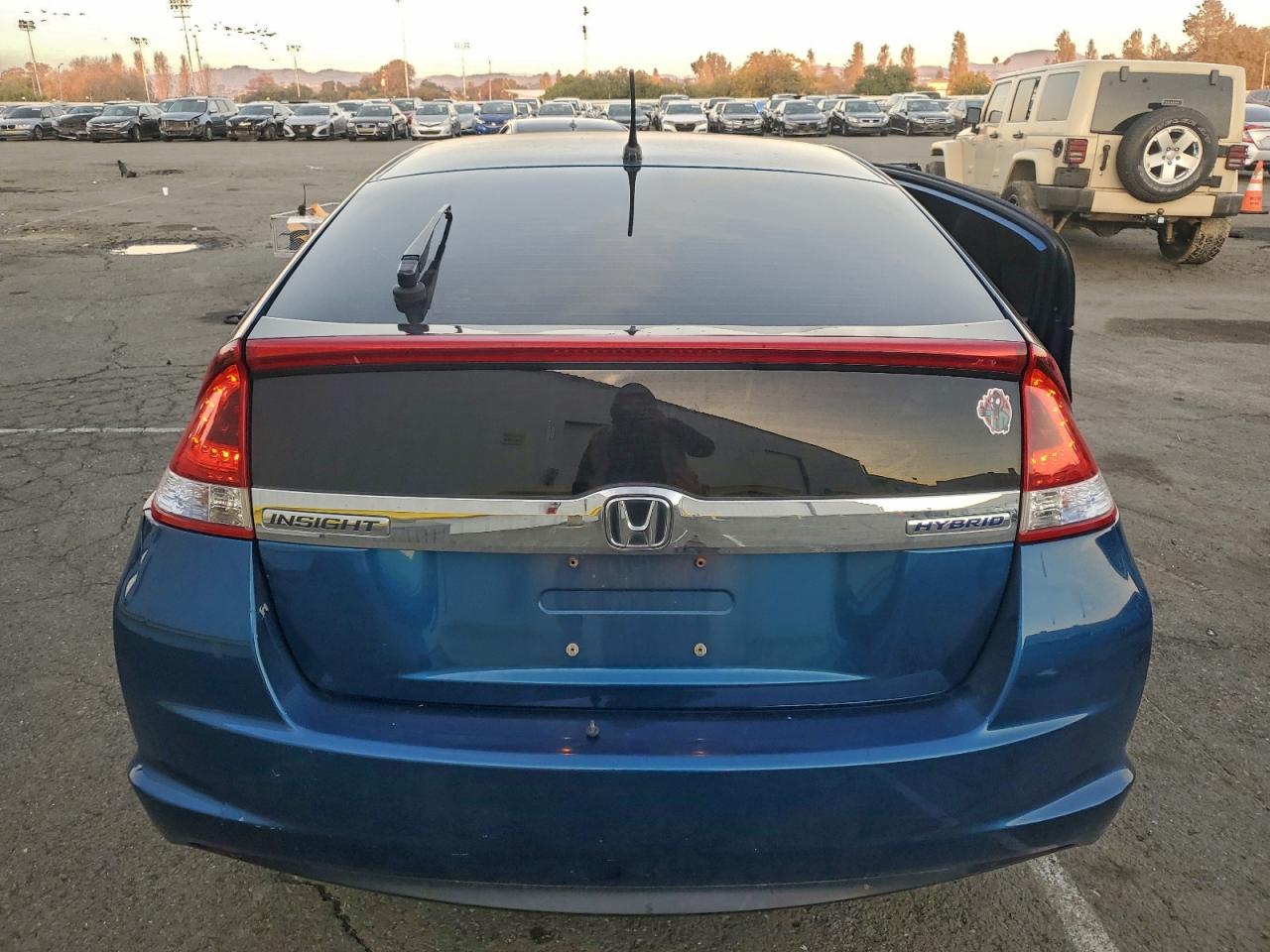 2012 Honda Insight Ex VIN: JHMZE2H71CS001445 Lot: 94375245