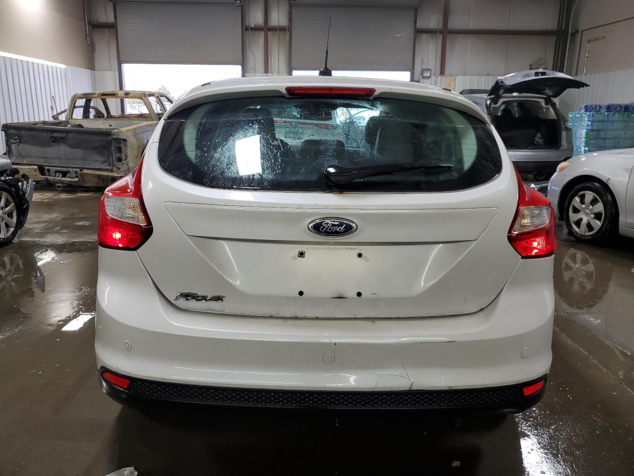 2012 Ford Focus Titanium VIN: 1FAHP3N22CL328328 Lot: 93297565