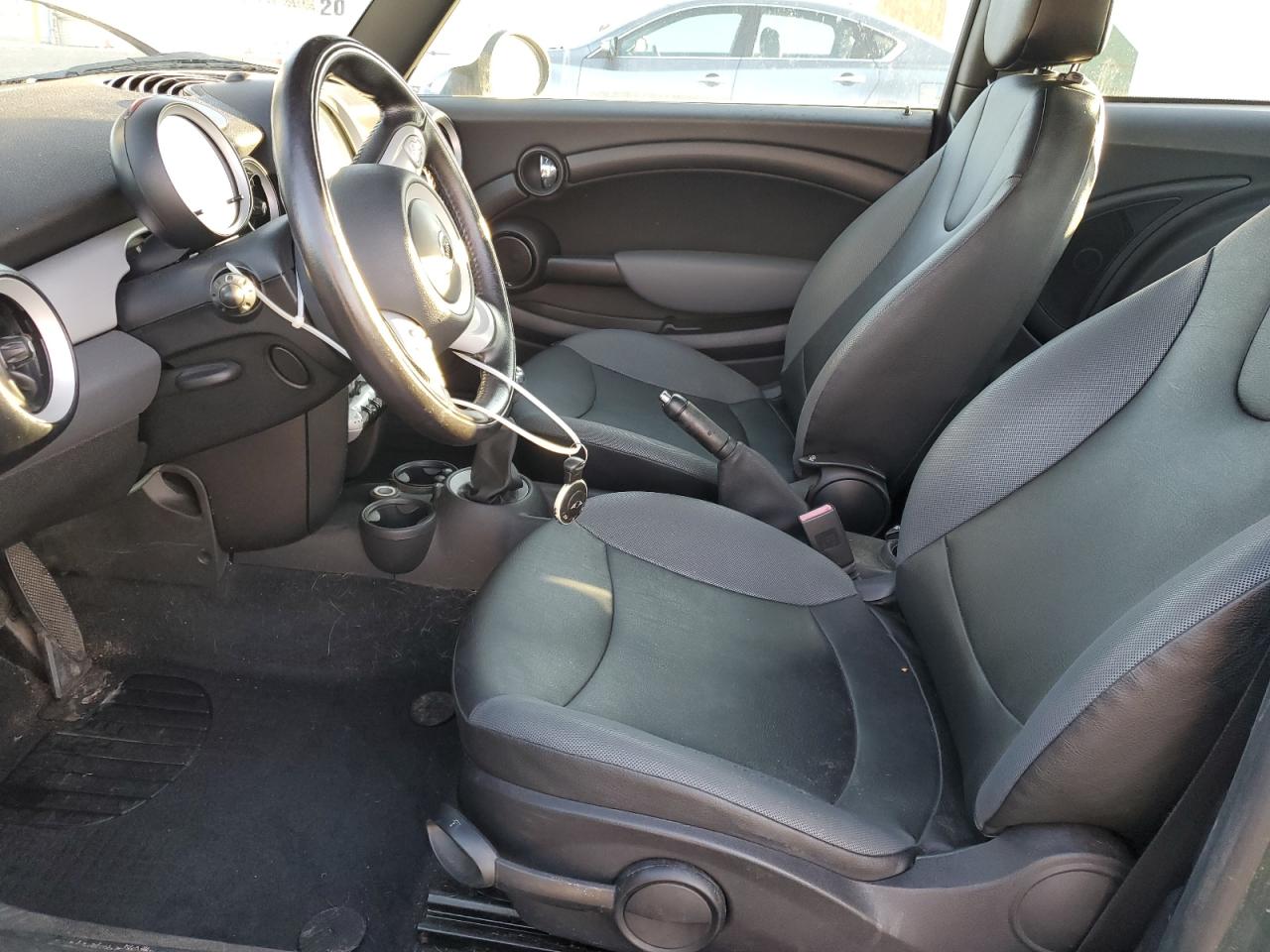 2009 Mini Cooper VIN: WMWMF33519TU74833 Lot: 93704245