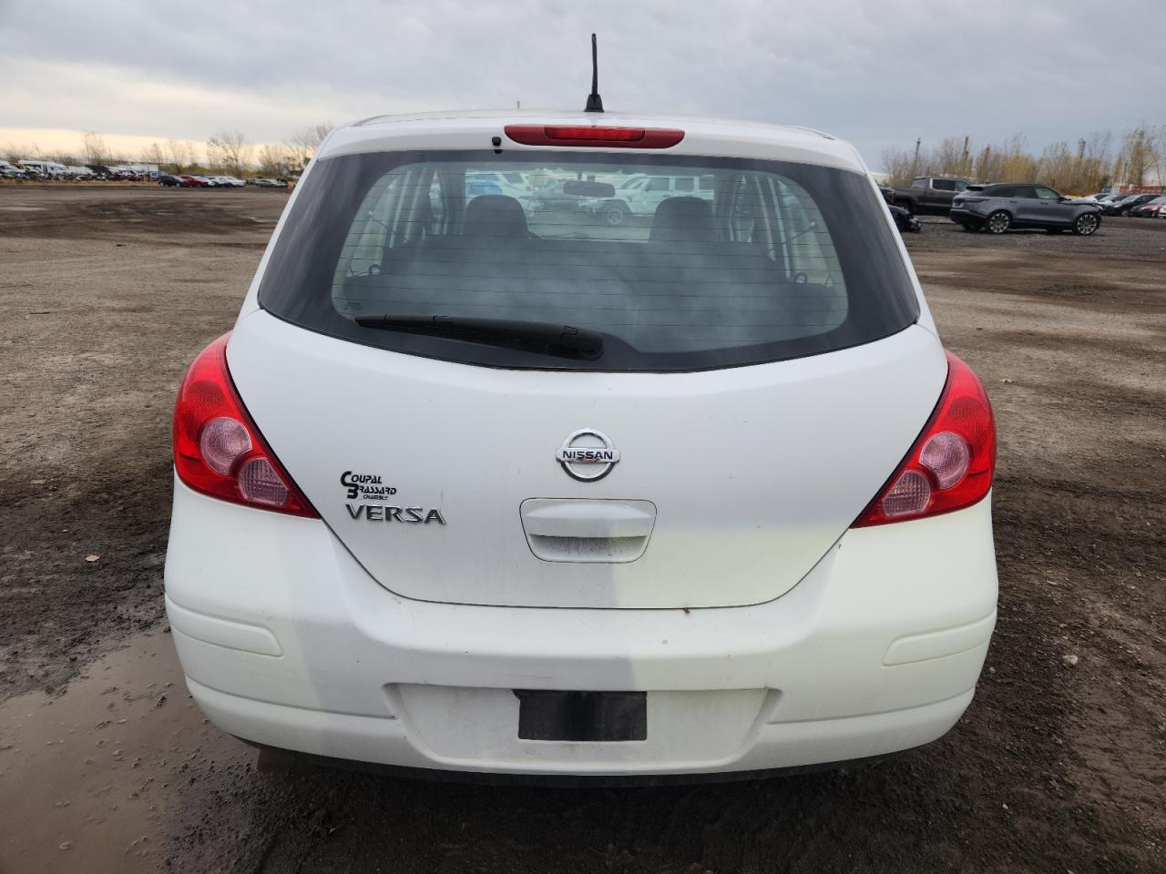 2009 Nissan Versa S VIN: 3N1BC13E79L488282 Lot: 91325065