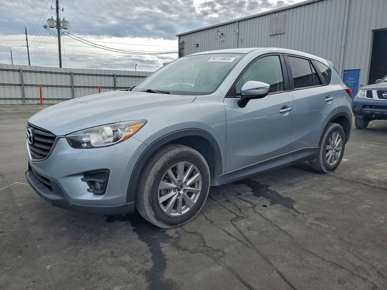 2016 Mazda Cx-5 Touring VIN: JM3KE4CY9G0606014 Lot: 94115855