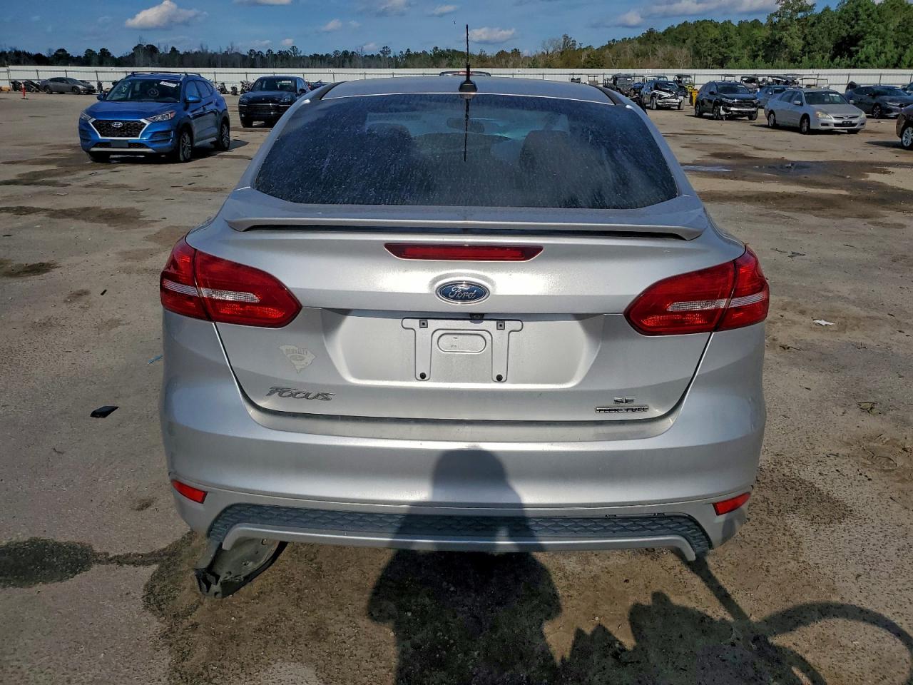 2015 Ford Focus Se VIN: 1FADP3F25FL291888 Lot: 91691845