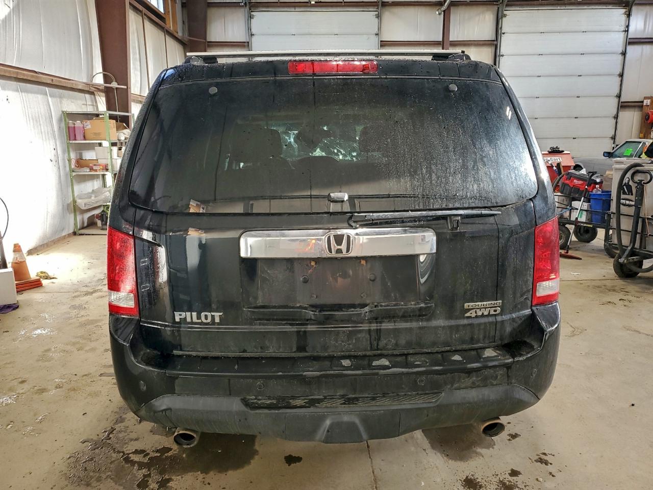 2014 Honda Pilot Touring VIN: 5FNYF4H93EB504742 Lot: 94115845