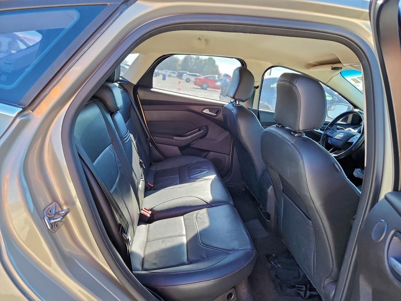 2016 Ford Focus Titanium VIN: 1FADP3N21GL259930 Lot: 94729485