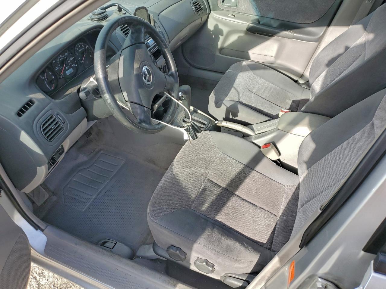 2003 Mazda Protege Dx VIN: JM1BJ226130111731 Lot: 94324375