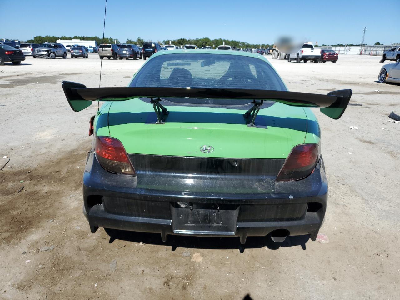 2001 Hyundai Tiburon VIN: KMHJG25F51U231104 Lot: 90334125