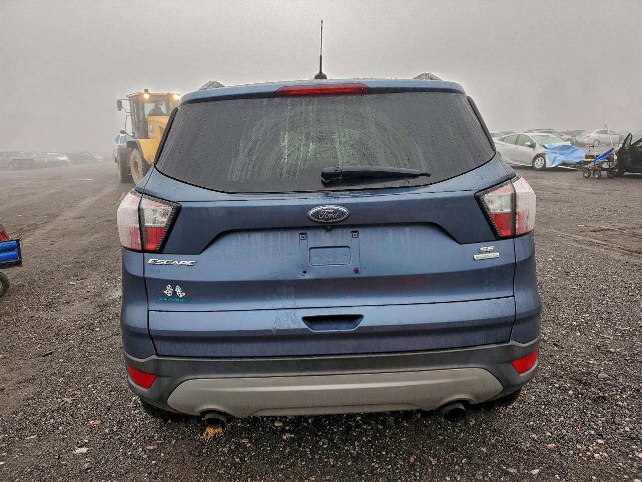 2018 Ford Escape Se VIN: 1FMCU0GD4JUB15460 Lot: 94268595