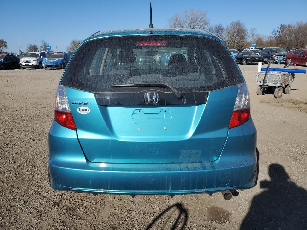 2012 Honda Fit VIN: JHMGE8H32CC008230 Lot: 92439165