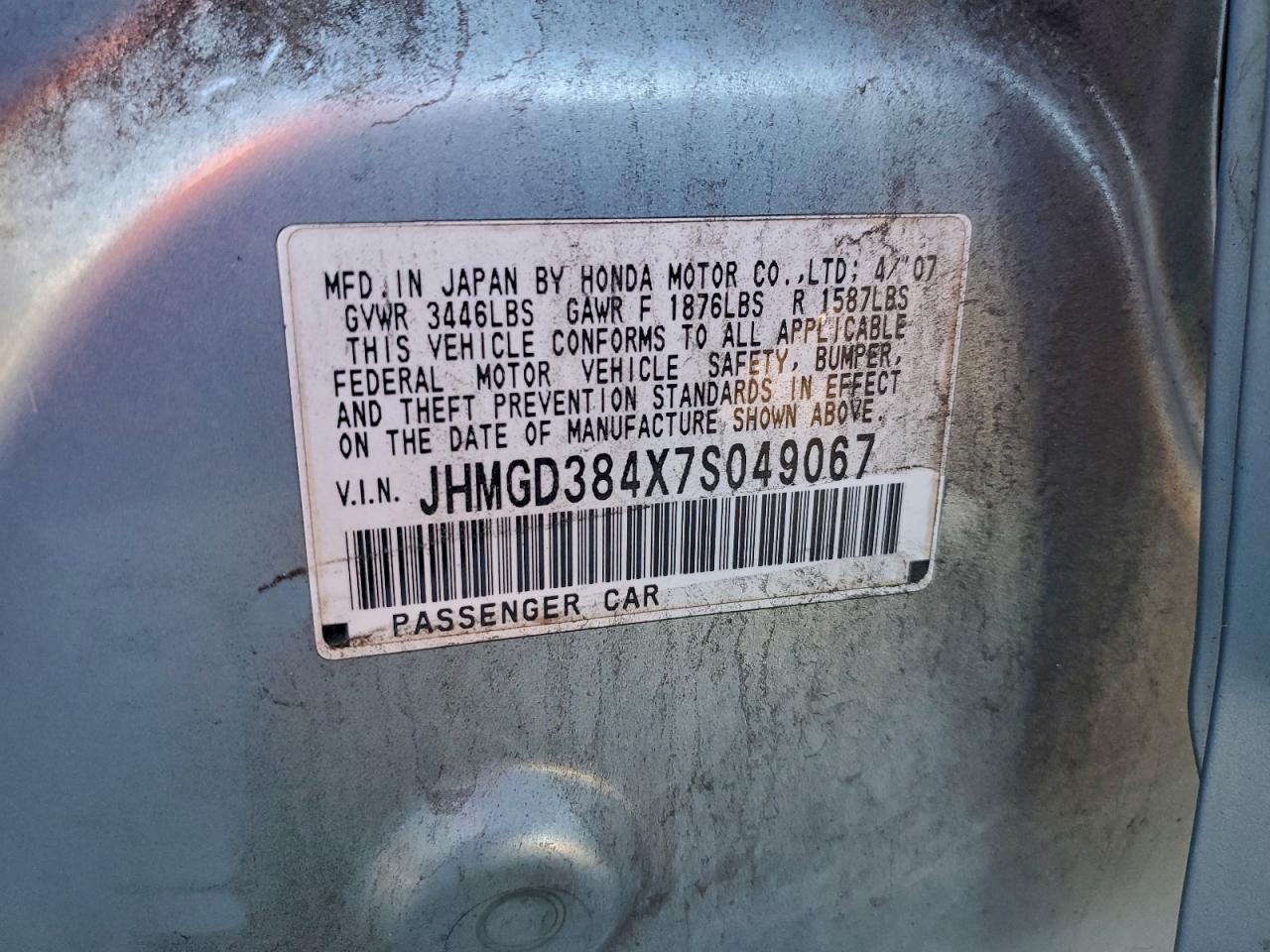 2007 Honda Fit VIN: JHMGD384X7S049067 Lot: 93898075