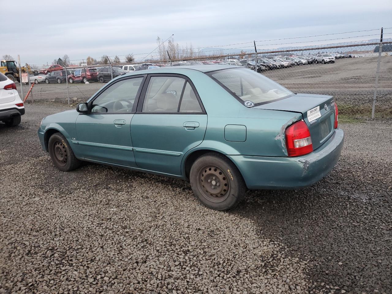 2001 Mazda Protege Dx VIN: JM1BJ222610448065 Lot: 93721325