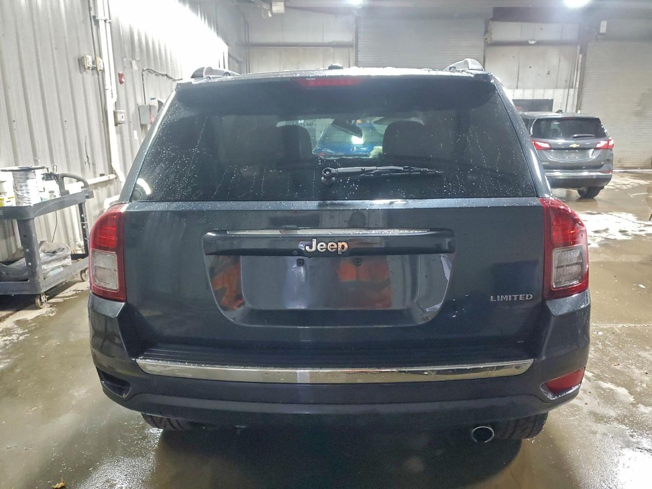 2014 Jeep Compass Limited VIN: 1C4NJCCB1ED652580 Lot: 94750435