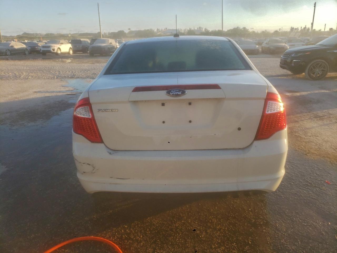 2012 Ford Fusion S VIN: 3FAHP0GA0CR237319 Lot: 93817695