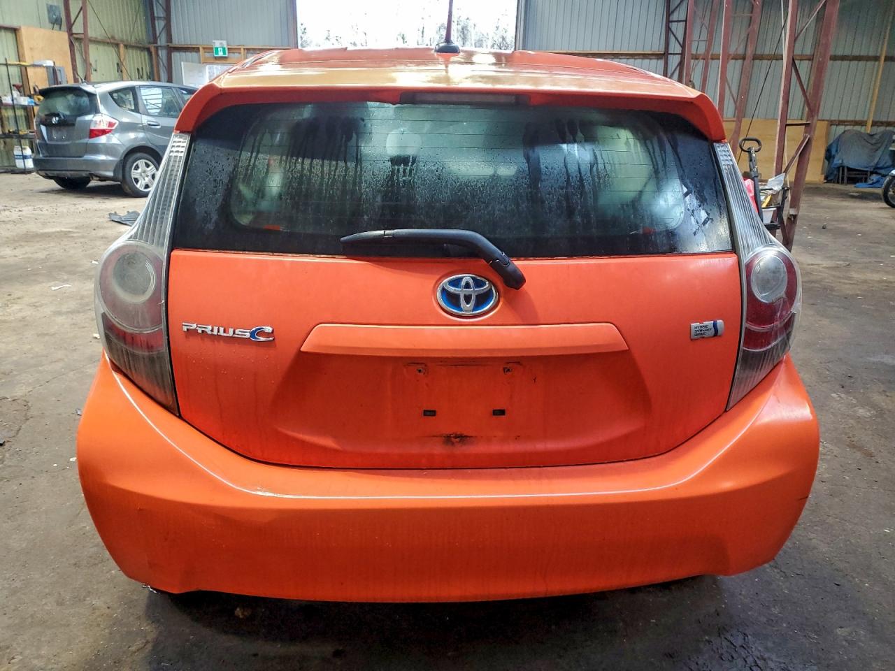 2012 Toyota Prius C VIN: JTDKDTB31C1012940 Lot: 93263745