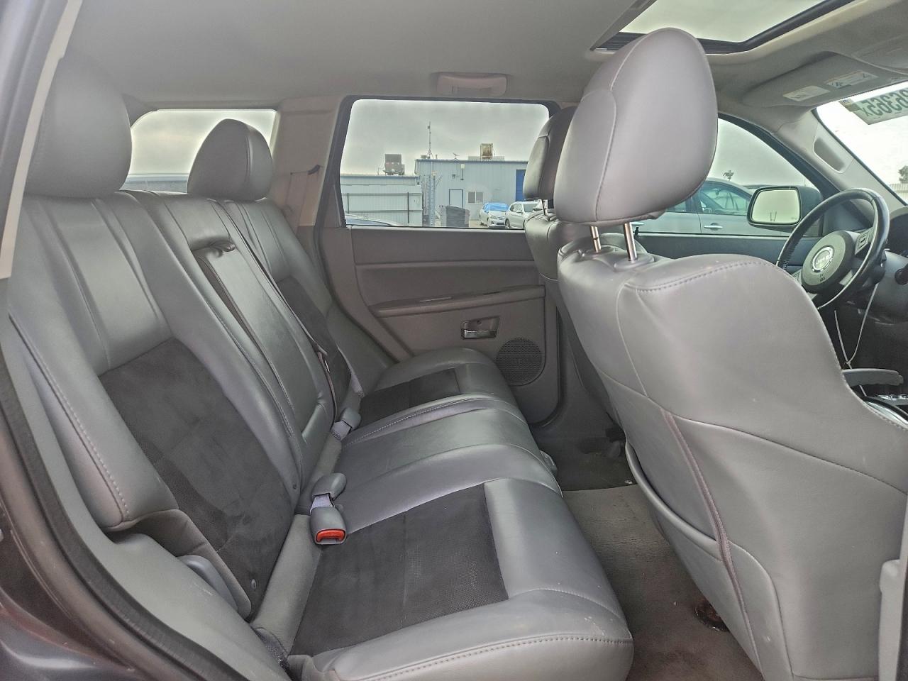 2007 Jeep Grand Cherokee Srt-8 VIN: 1J8HR783X7C557497 Lot: 94736365