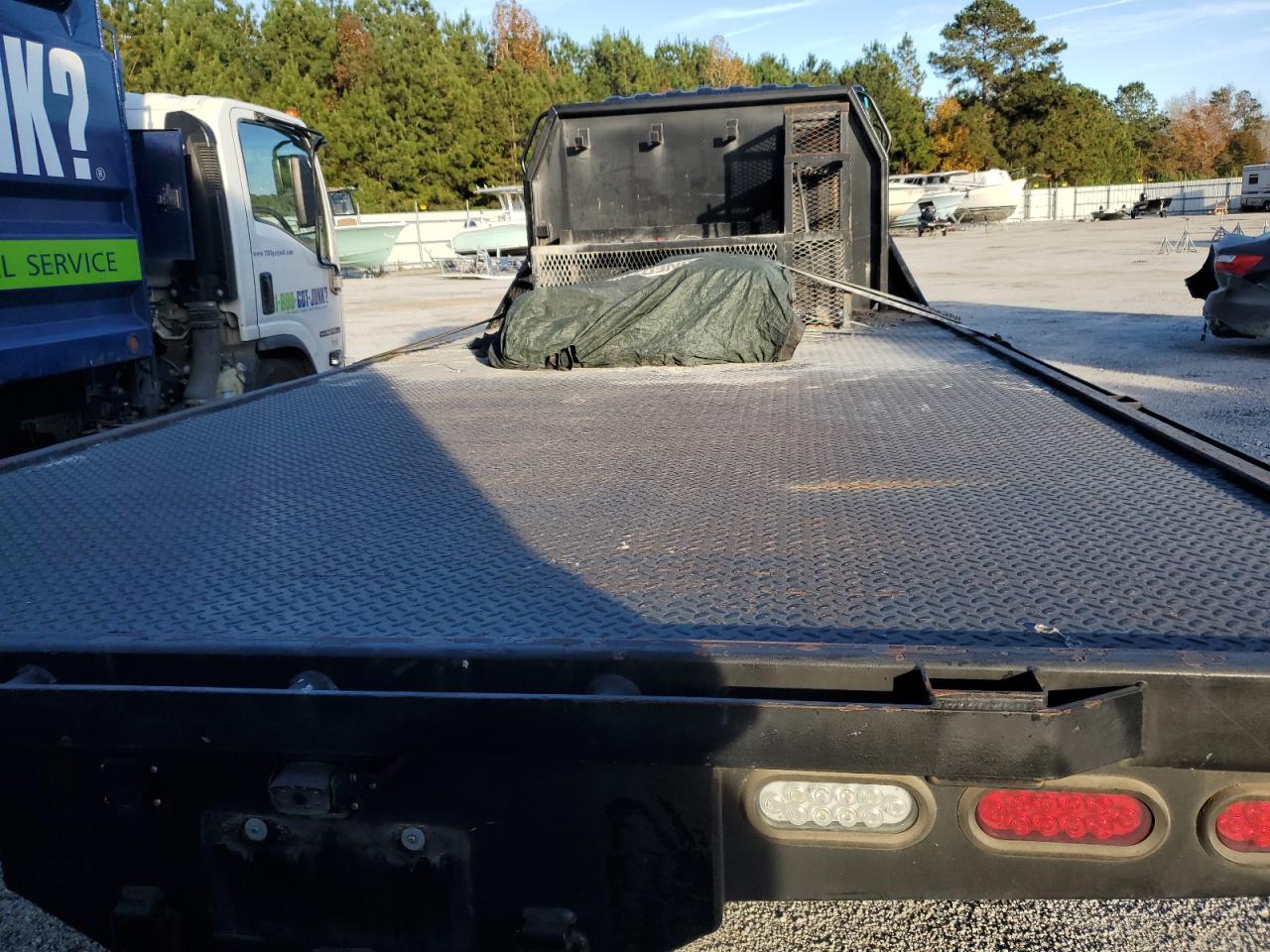 2015 Isuzu Npr Hd Flatbed Truck VIN: 54DC4W1B5FS802380 Lot: 90488095