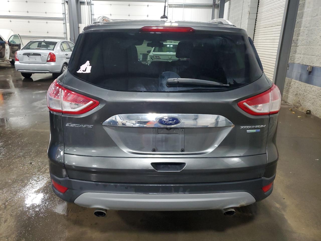 2016 Ford Escape Titanium VIN: 1FMCU9JX4GUB87338 Lot: 91311525