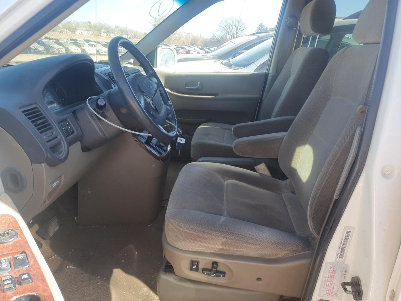 2003 Kia Sedona Ex VIN: KNDUP131536407174 Lot: 91831565