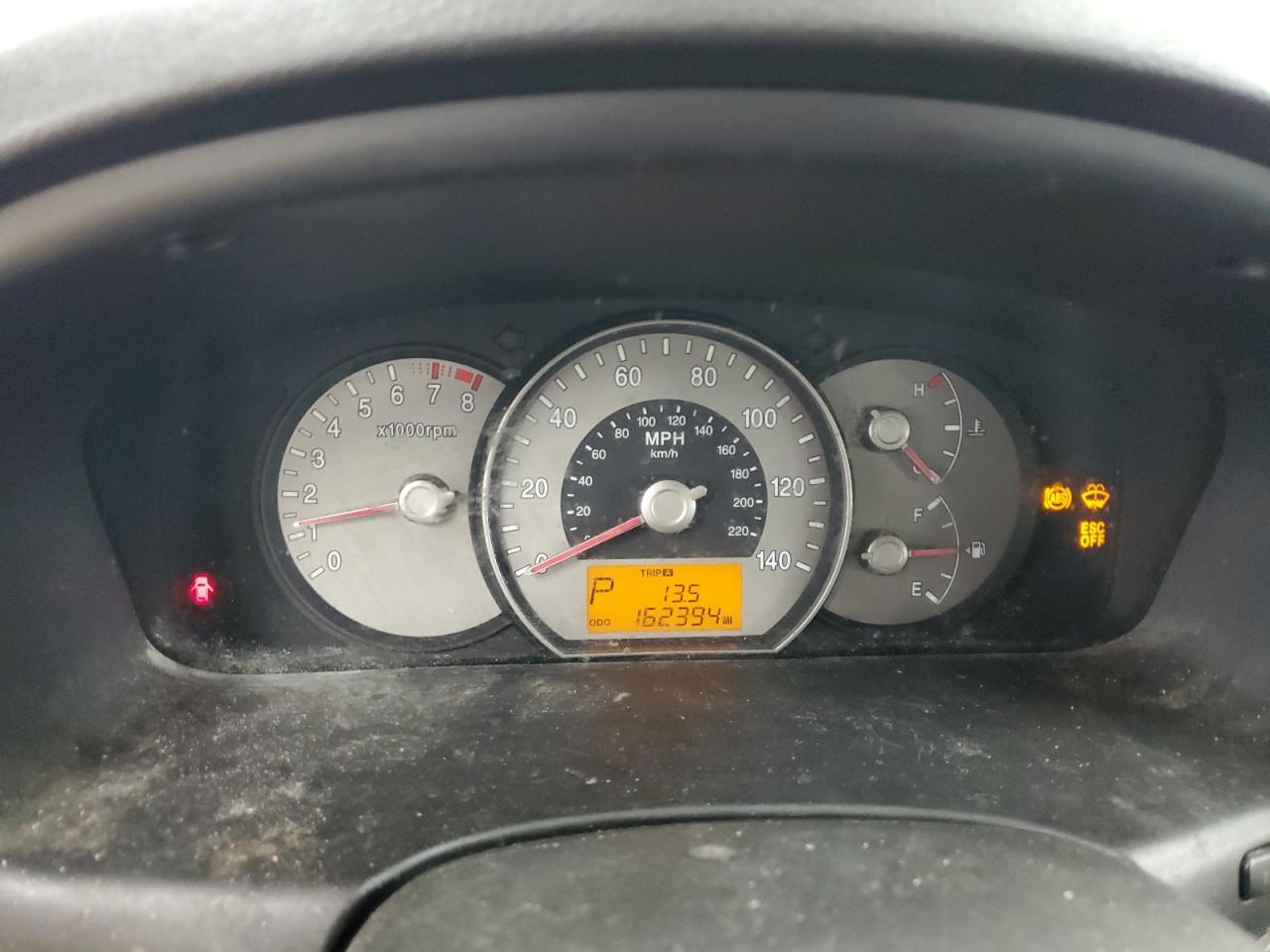 2007 Kia Rondo Base VIN: KNAFG525977037879 Lot: 90603625