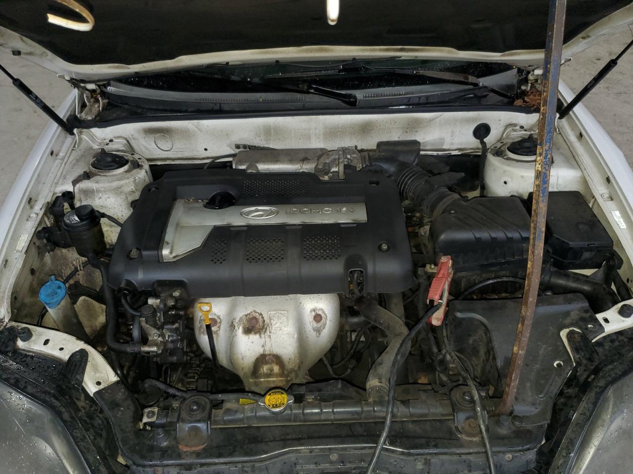 2005 Hyundai Tiburon VIN: KMHHM65D75U180109 Lot: 93043595