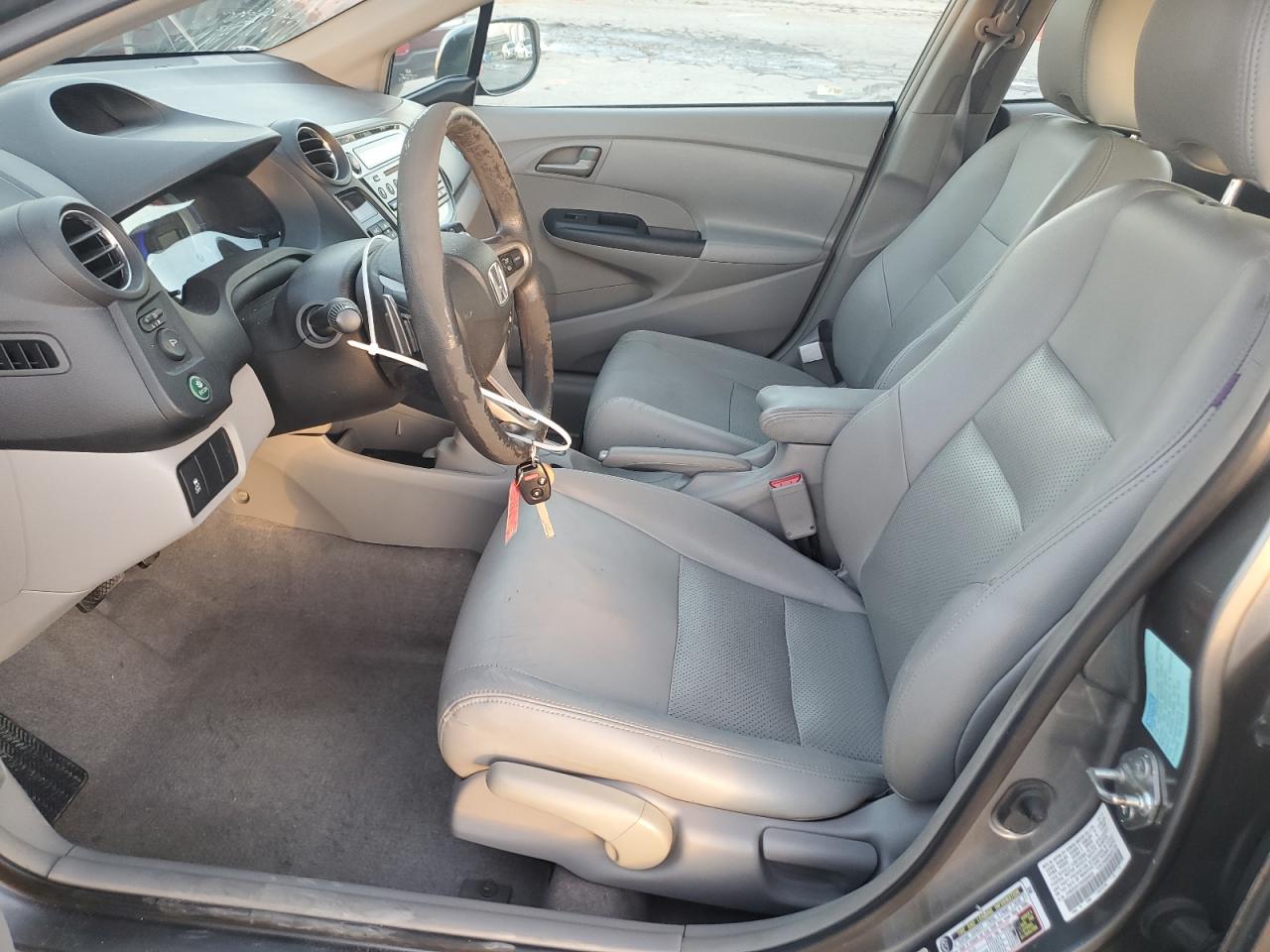 2011 Honda Insight Ex VIN: JHMZE2H72BS004823 Lot: 92285525