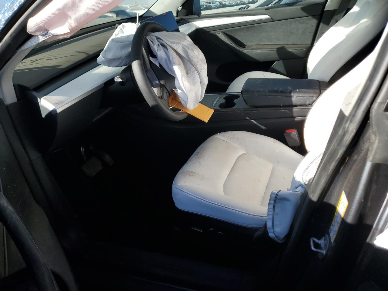 2023 Tesla Model Y VIN: 7SAYGAEEXPF868126 Lot: 92115305