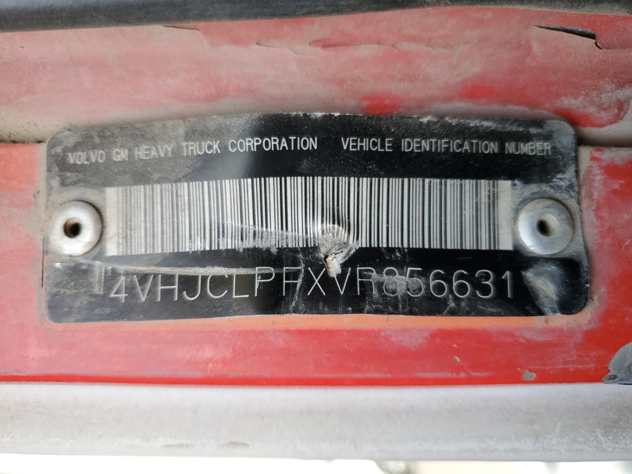 1997 Volvo Roll-Off Container Truck VIN: 4VHJCLPFXVR856631 Lot: 90477735