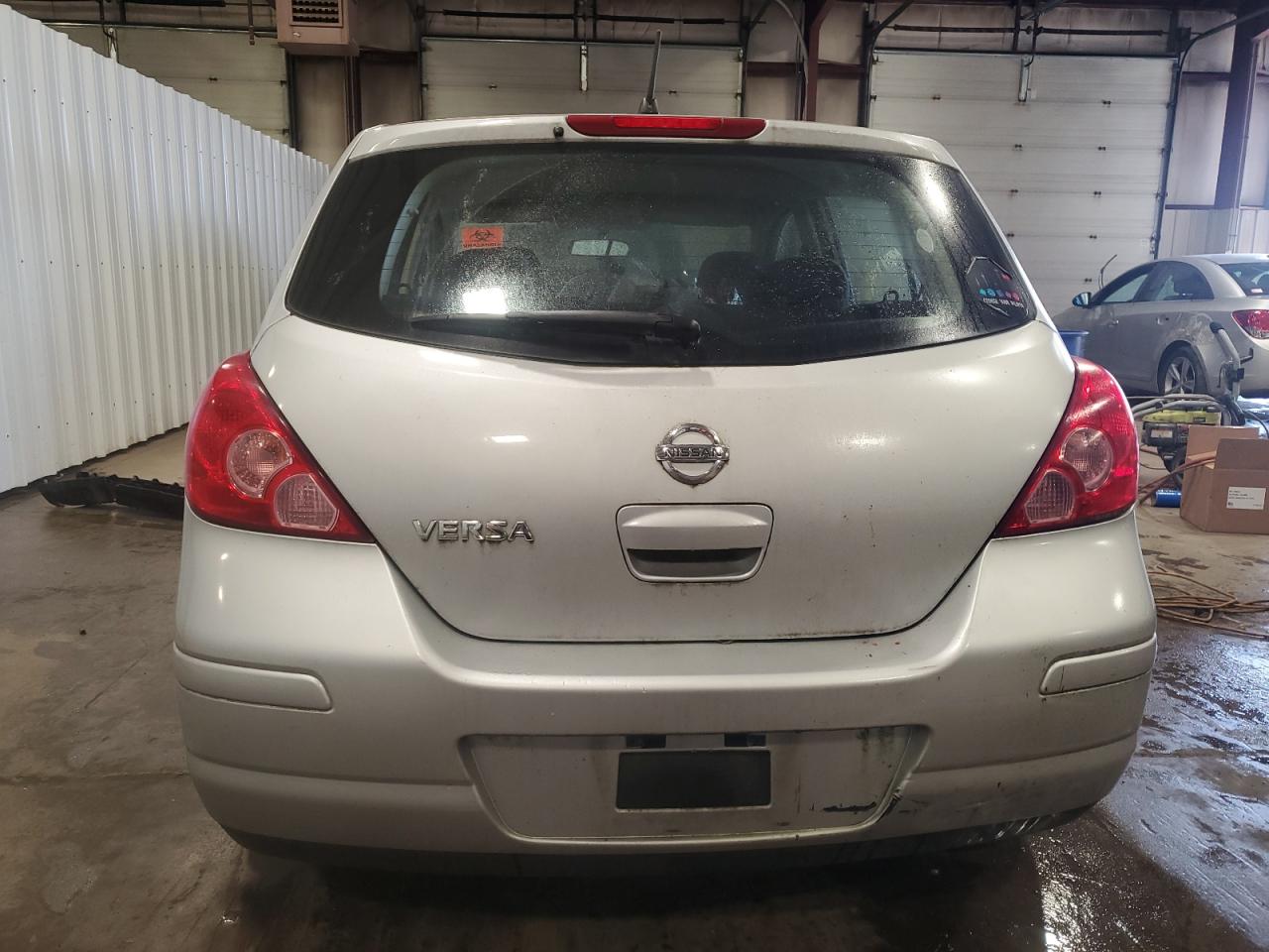 2009 Nissan Versa S VIN: 3N1BC13E49L369881 Lot: 91810435